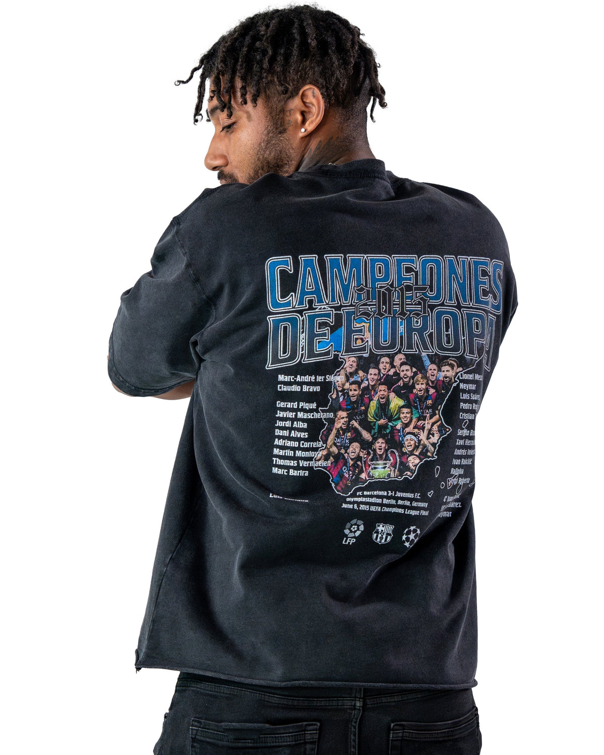 Model wearing dark Messi Treble Szn T-shirt, back view by MADEBYFUTBOL