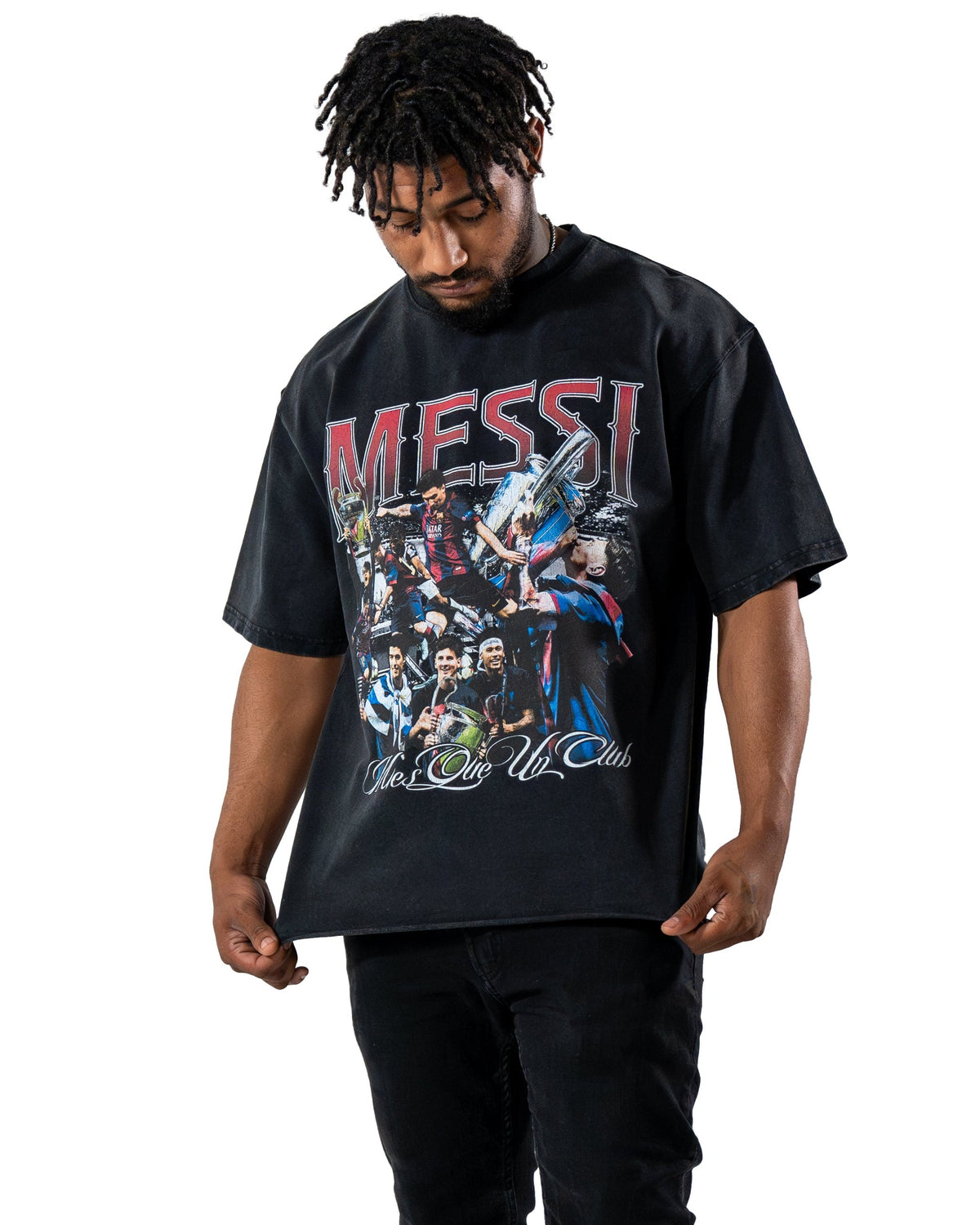 Model wearing dark Messi Treble Szn T-shirt, front view by MADEBYFUTBOL
