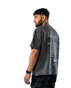 Model wearing dark R9 Ronaldo Signature T-shirt, back view by MADEBYFUTBOL
